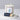 Lucette+Mo Adrift Candle – luxury coastal candle in glass jar with sailboat artwork and matches