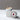 Lucette+Mo Celebration 2oz Travel Candle – cozy holiday tin candle with cranberry, cinnamon, and fir.