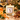 REVELRY 11 oz candle lit with citrus, champagne and praline