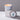 Lucette+Mo Adrift 6oz Travel Candle – coastal tin candle with sea salt, lemon, and thyme
