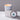 Lucette+Mo Escape 6oz Travel Candle – citrus and sea-inspired tin candle with grapefruit, tea, and salt