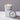 : Lucette+Mo Hideaway 6oz Travel Candle – tropical vanilla and citrus tin candle with soft spice
