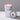 Lucette+Mo Stargazing 6oz Travel Candle – warm night-sky inspired tin candle with rum, vanilla, and currant